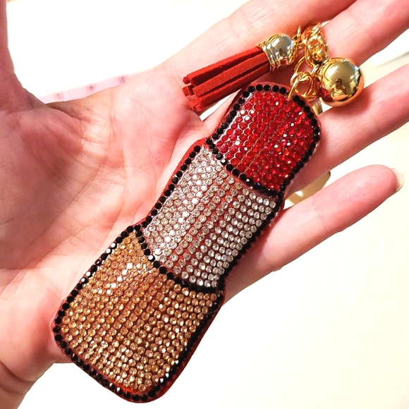 Boutique Accessories - Red lipstick rhinestone covered keychain with ball and tassel goldtone Chic